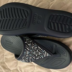 Womens navy blue CROCS sandals.